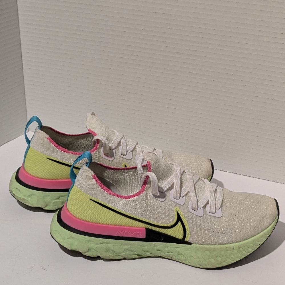 Nike Women's White Flyknit Running Shoes with Neon Accents